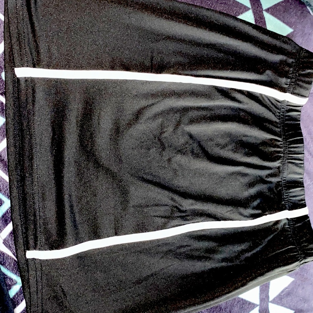 Fancyqube black skirt, with white stripe.